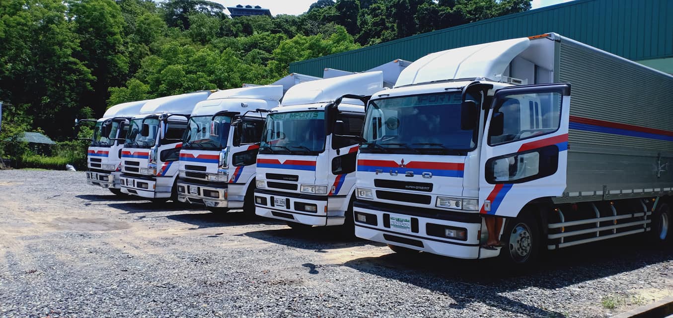 Modern logistics operations with truck and warehouse